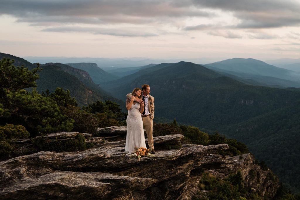 Couple standing on rocks in the Linville Gorge Wilderness