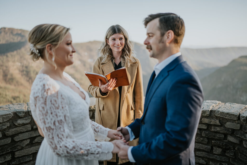A North Carolina based officiant performing a ceremony for an eloping couple in the mountains.